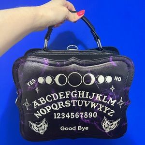 Monster Creations purple ouija board purse